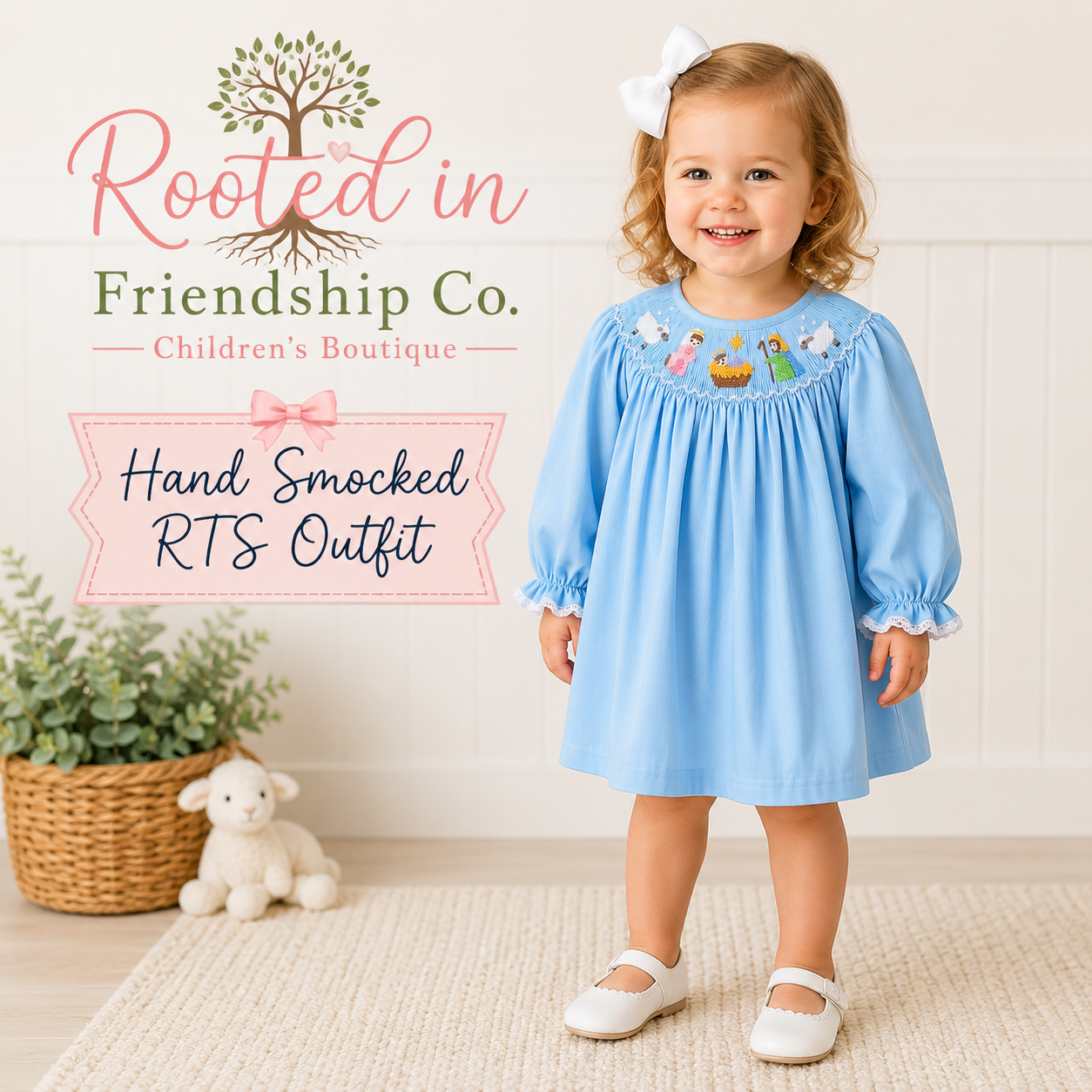 BLUE NATIVITY HAND SMOCKED DRESS