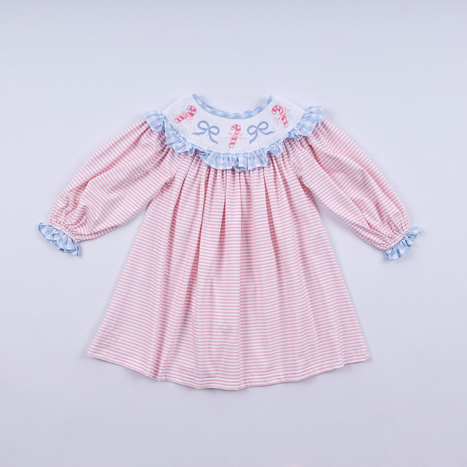 PINK CANDY CANE BOW HAND SMOCKED RUFFLE DRESS