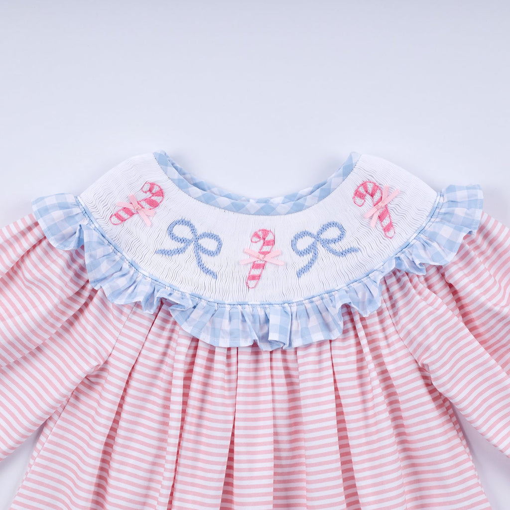 PINK CANDY CANE BOW HAND SMOCKED RUFFLE DRESS