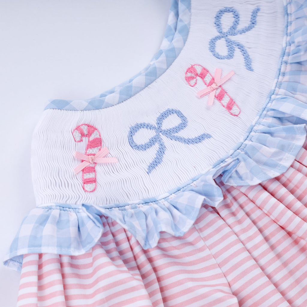 PINK CANDY CANE BOW HAND SMOCKED RUFFLE DRESS