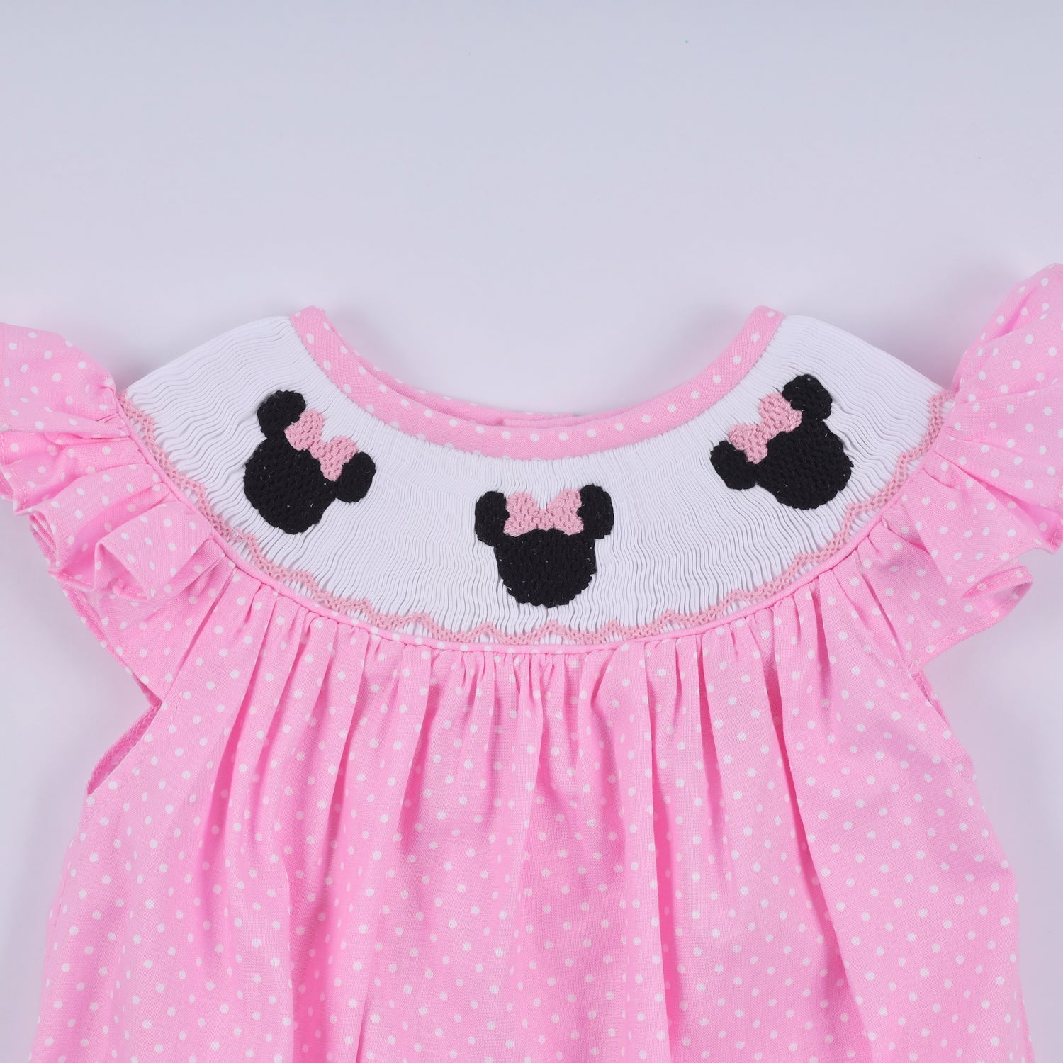 PINK CHARACTER HAND SMOCKED DOT RUFFLE BUBBLE