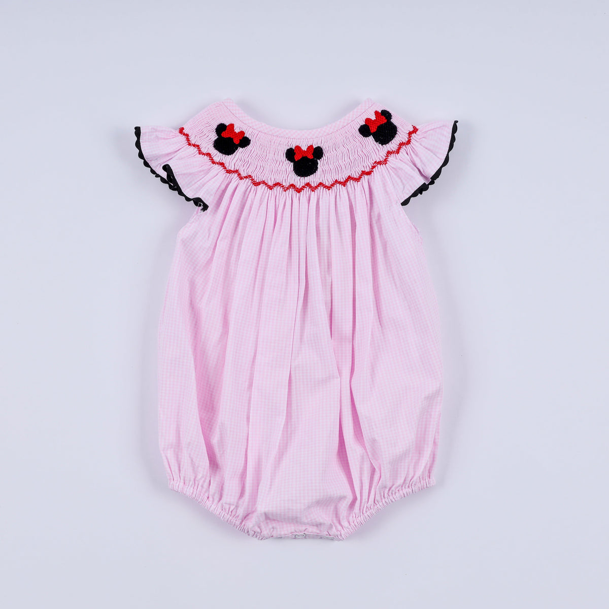 Red character hand smocked plaid ruffle bubble