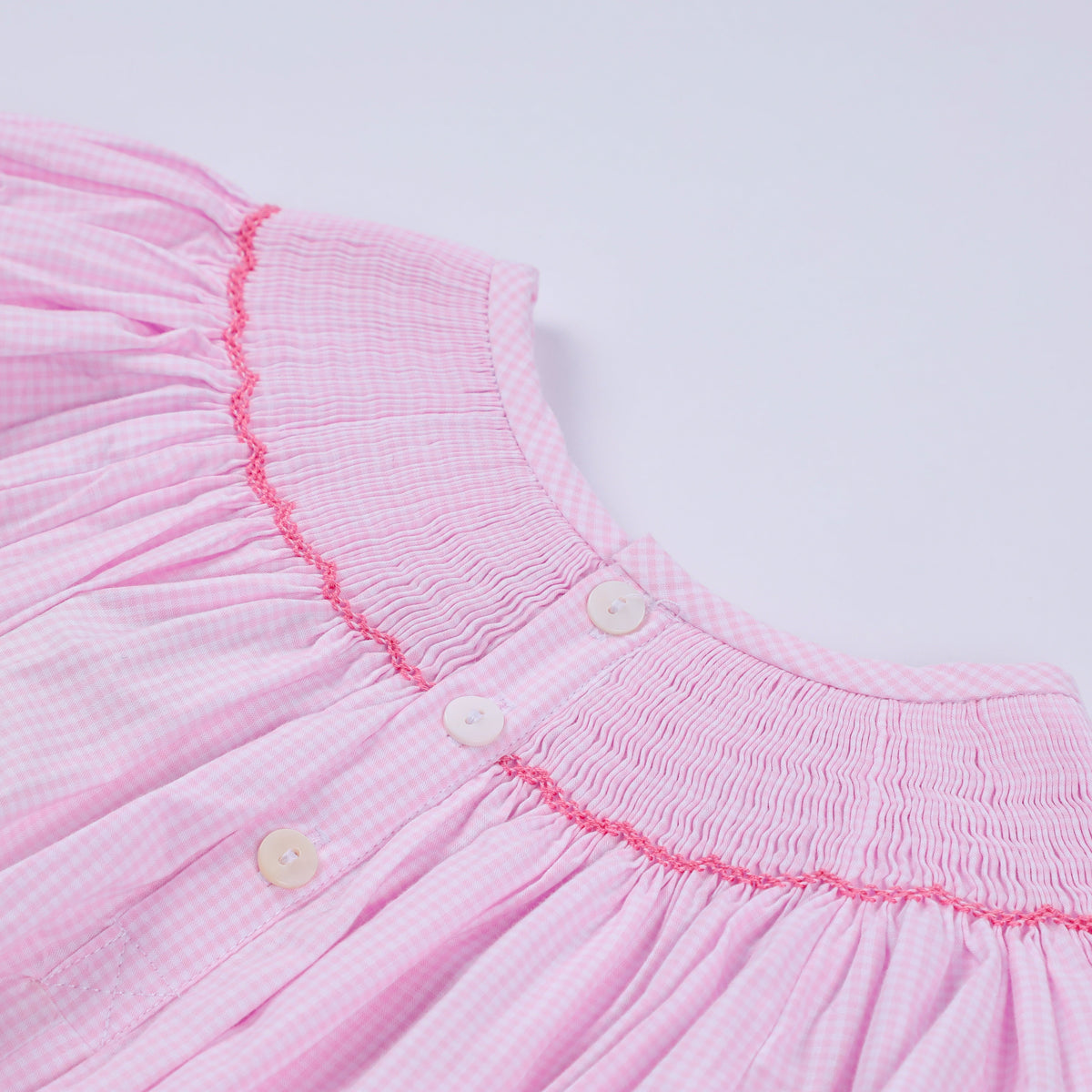Pink christmas tree hand smocked ruffle romper