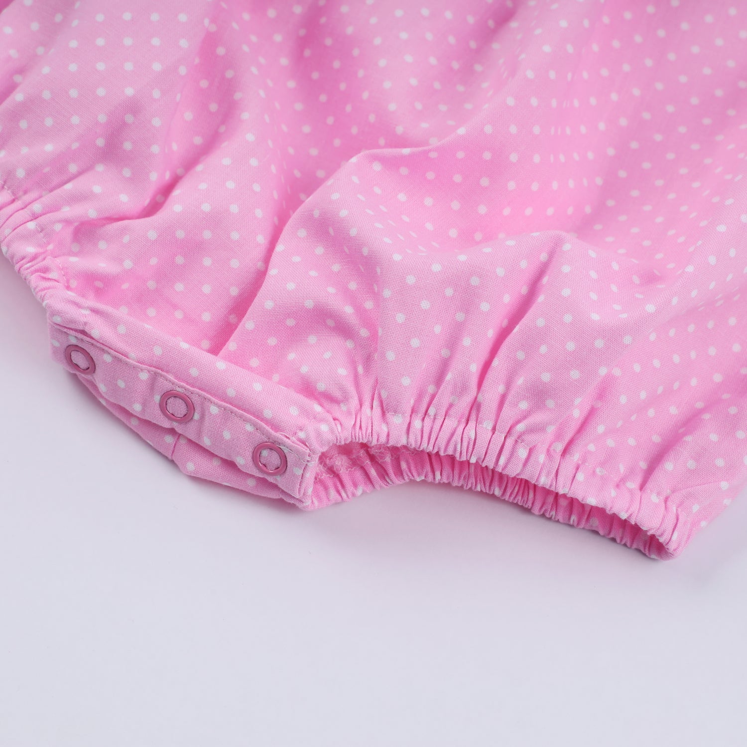 PINK CHARACTER HAND SMOCKED DOT RUFFLE BUBBLE